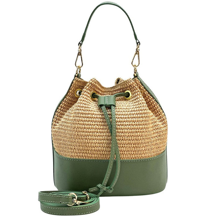 Woven bucket bag with green base and strap on a white background