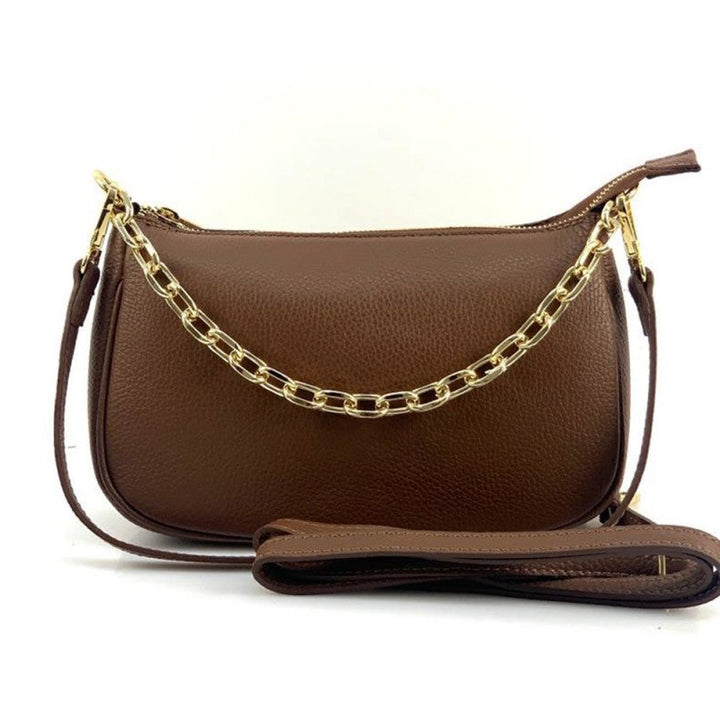 Brown handbag with a gold chain strap on a white background