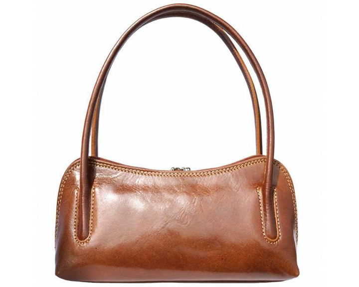Brown leather handbag on a white background