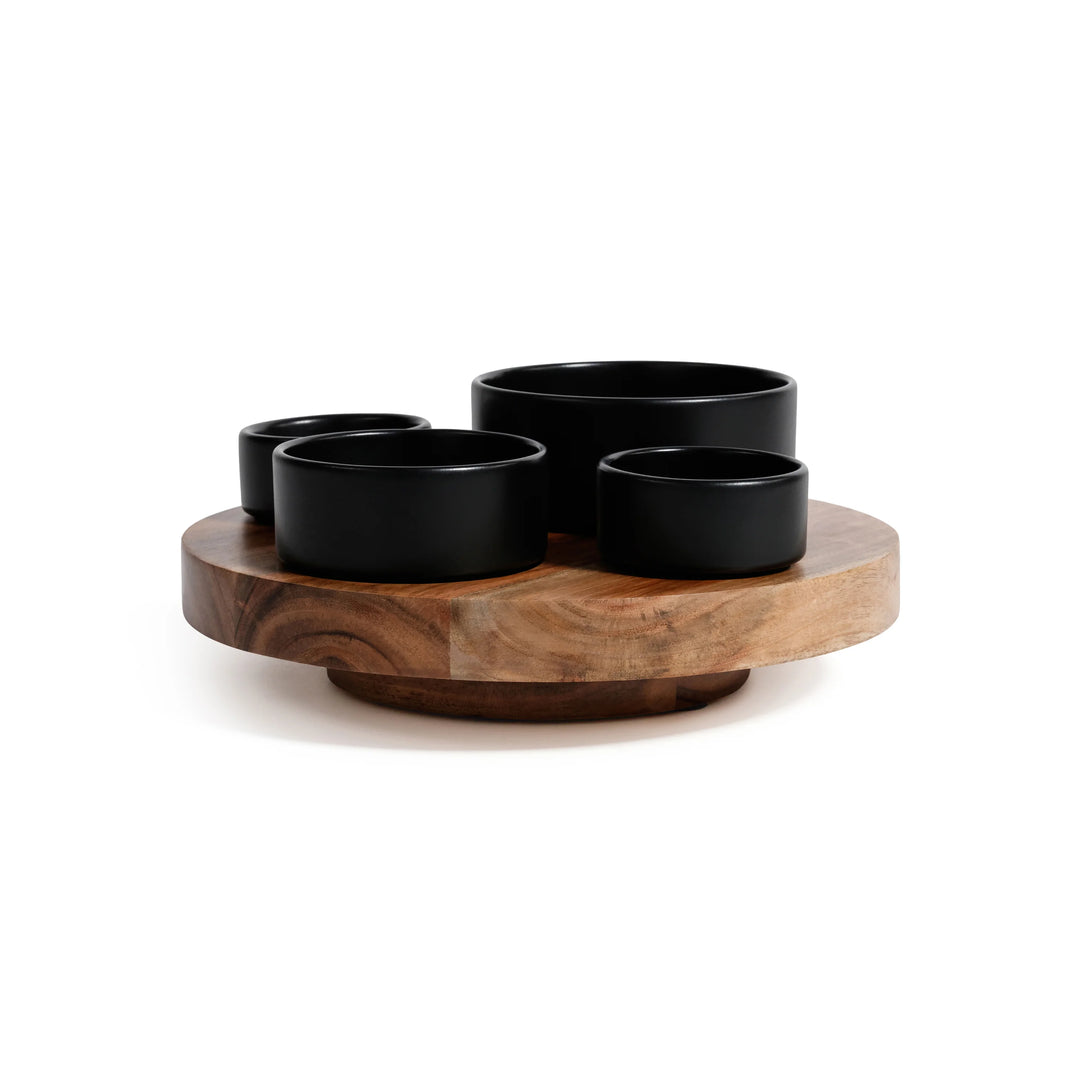 Set of black bowls on a wooden tray with a white background | Artisans