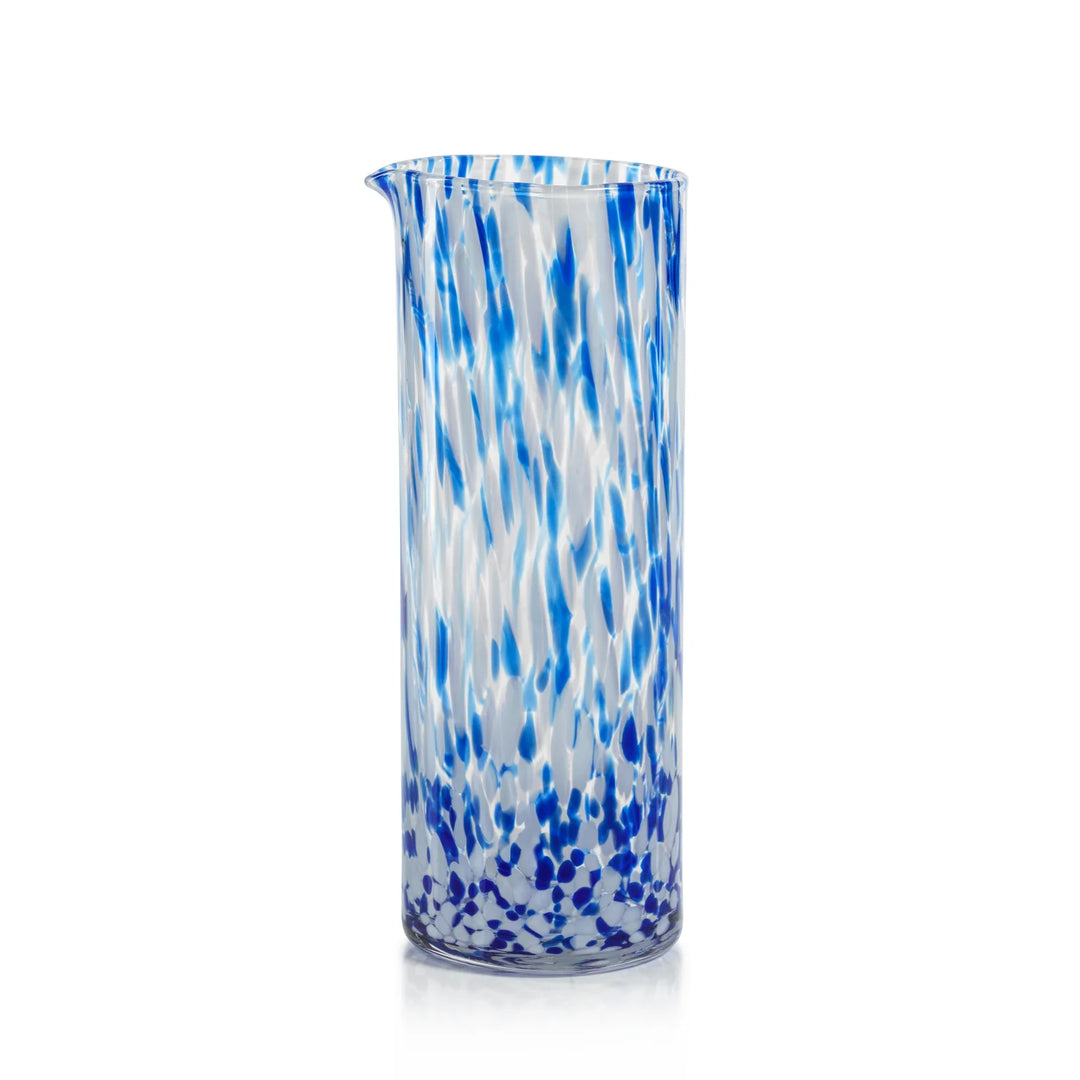 Glass vase with blue and white abstract pattern on a white background | Artisans
