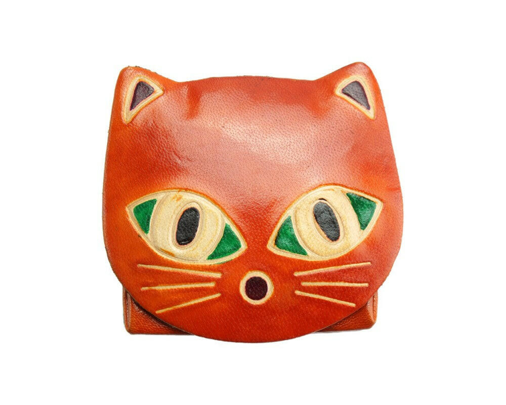 Sassy leather coin purse hiding your spare change like a secret agent with style and flair.