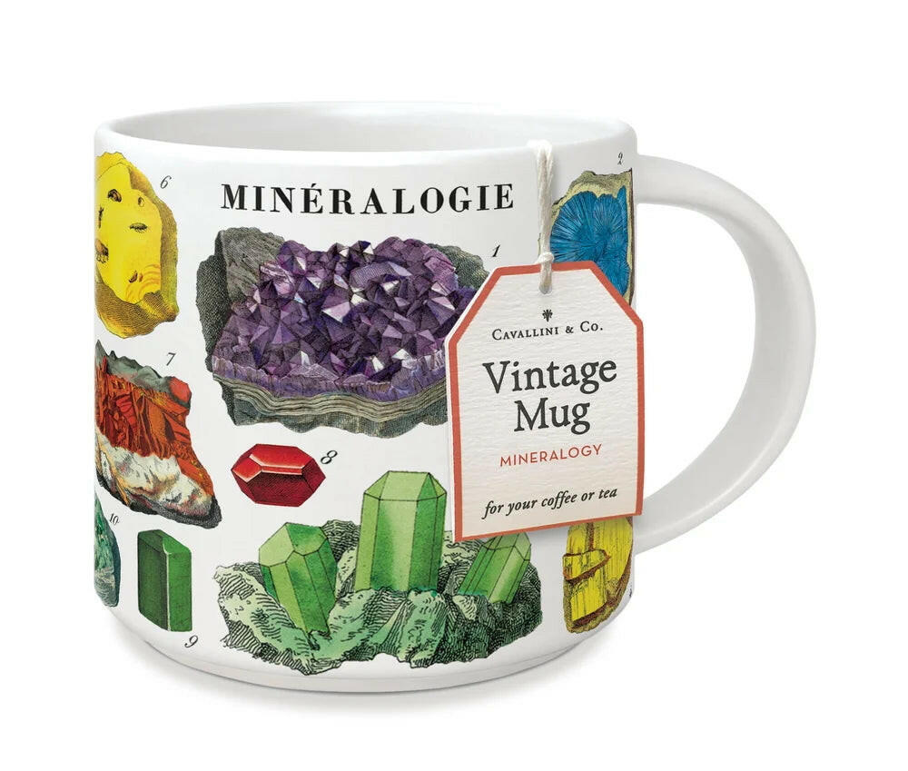 Mug with mineral-themed design and 'Mineralogie' text on a white background