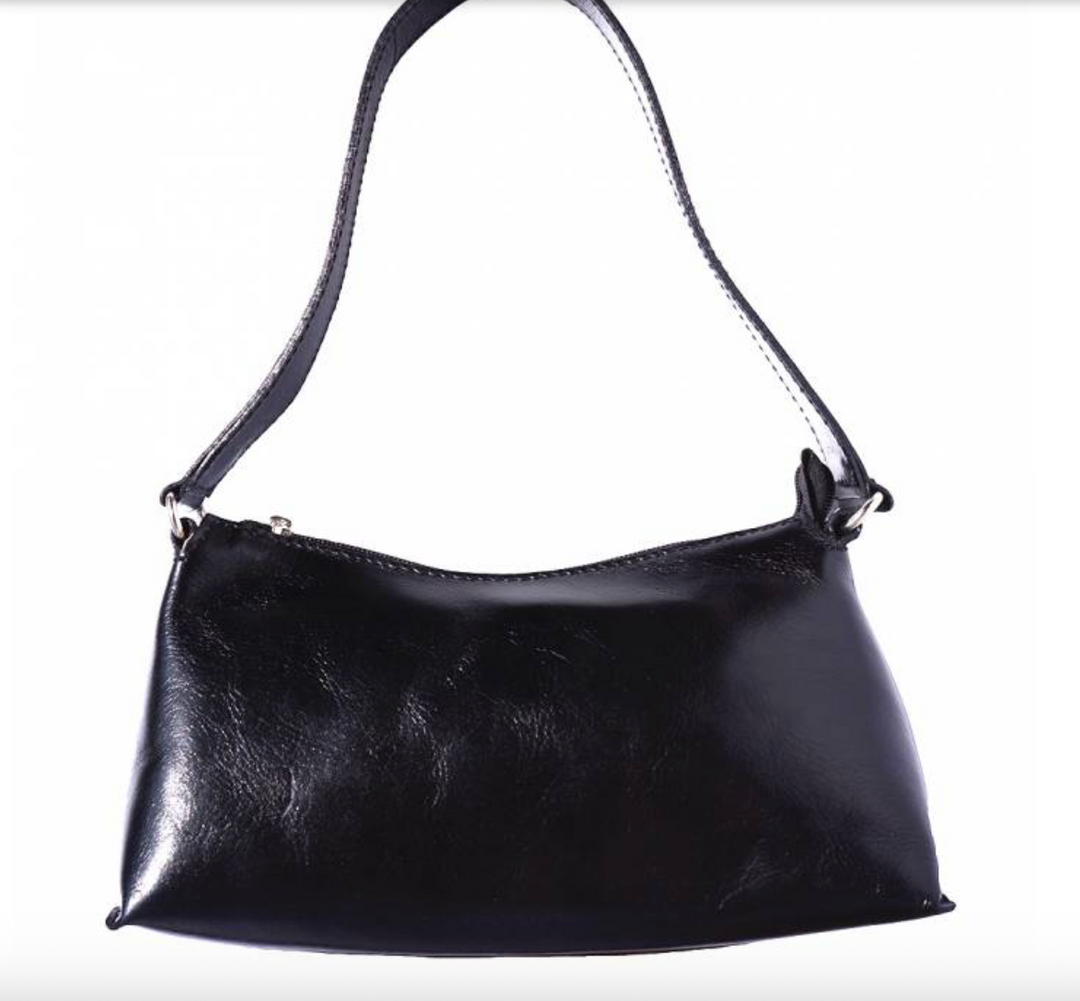 Elegant leather handbag showcasing premium craftsmanship and timeless style, perfect for sophisticated fashion enthusiasts.