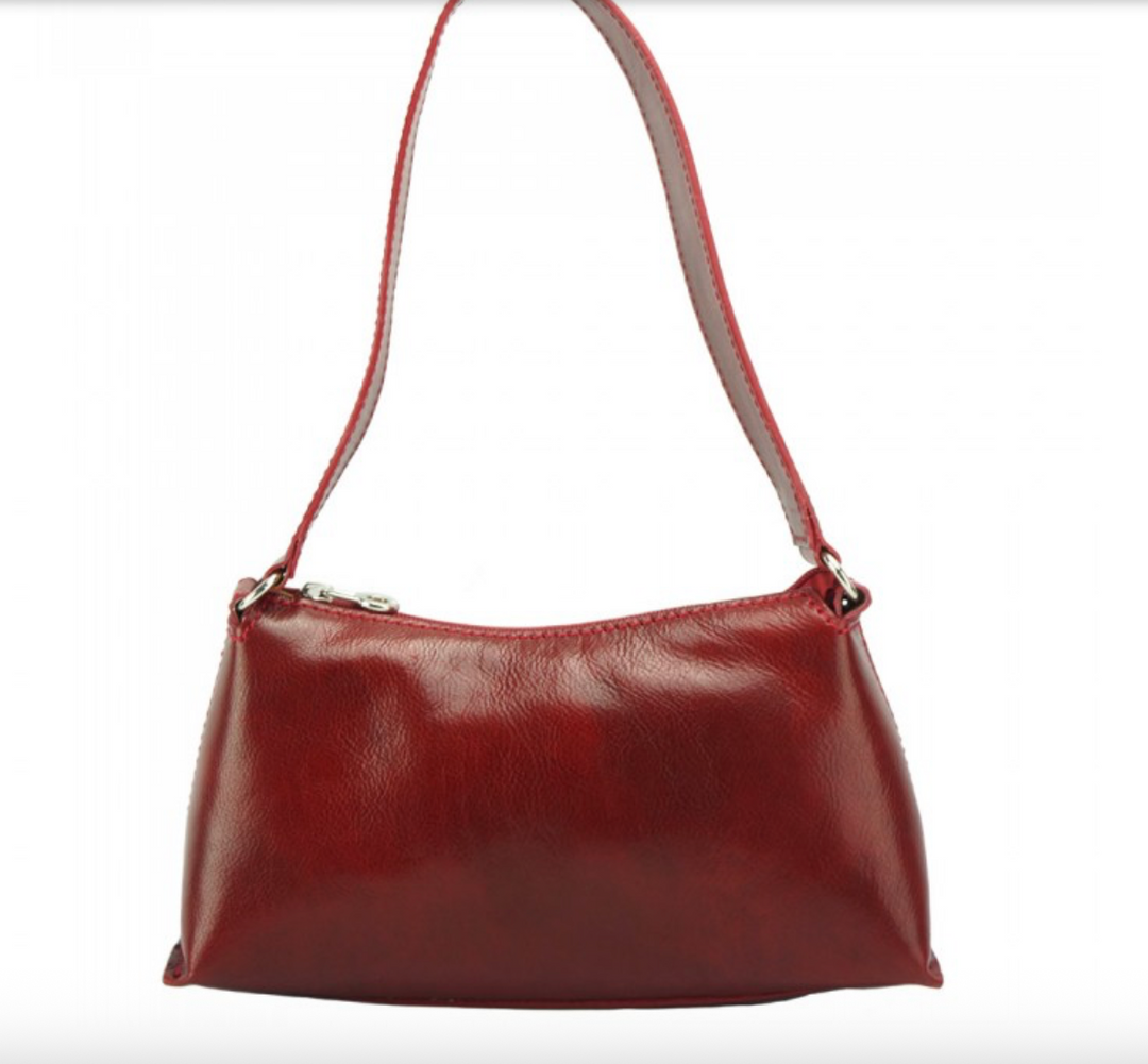 Elegant leather handbag showcasing premium craftsmanship and timeless style, perfect for sophisticated fashion enthusiasts.