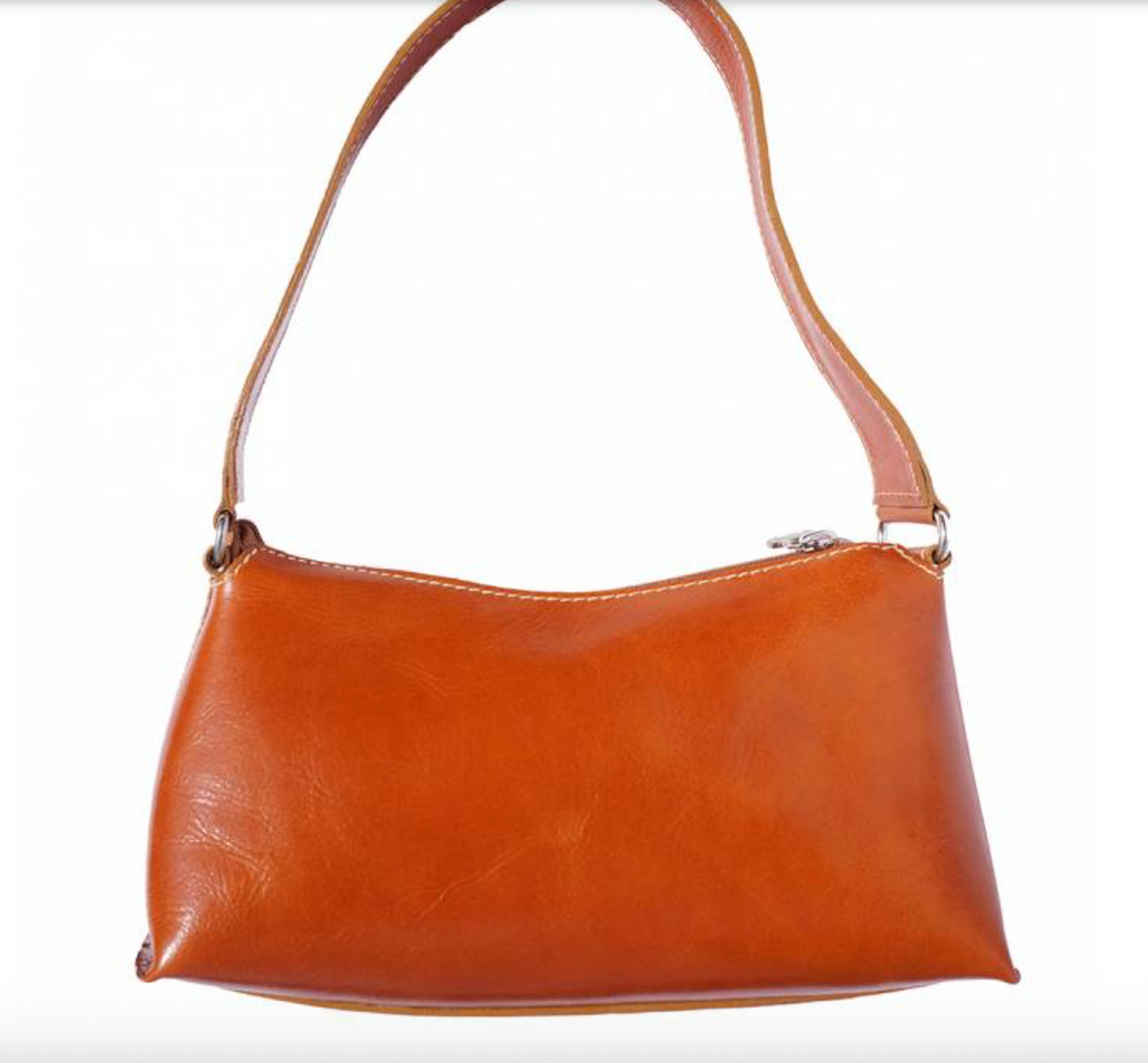 Elegant leather handbag showcasing premium craftsmanship and timeless style, perfect for sophisticated fashion enthusiasts.