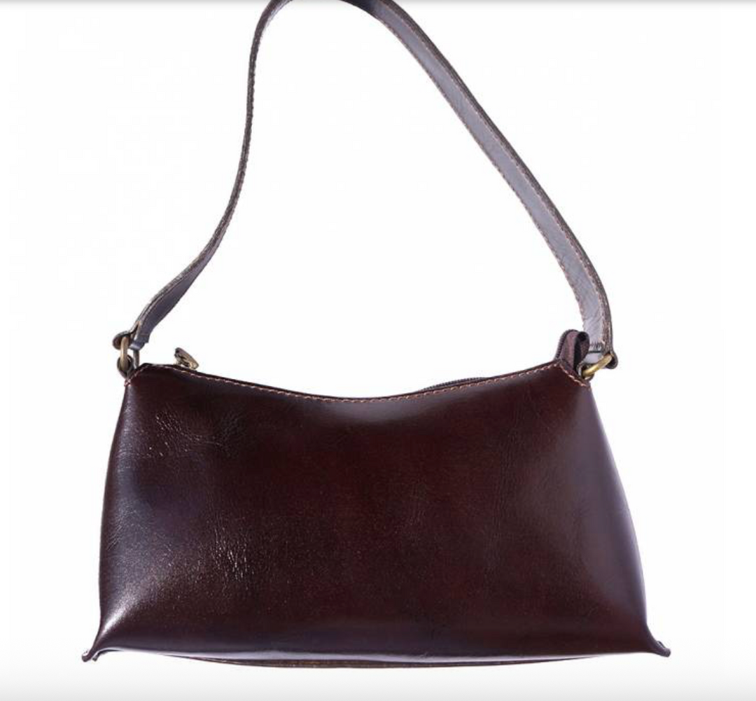 Elegant leather handbag showcasing premium craftsmanship and timeless style, perfect for sophisticated fashion enthusiasts.