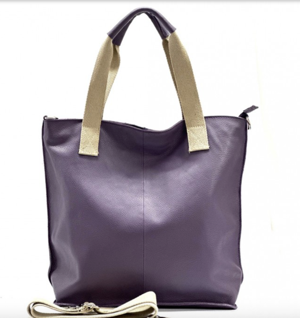 Elegant leather tote bag showcasing exquisite craftsmanship and luxurious design, perfect for sophisticated style.
