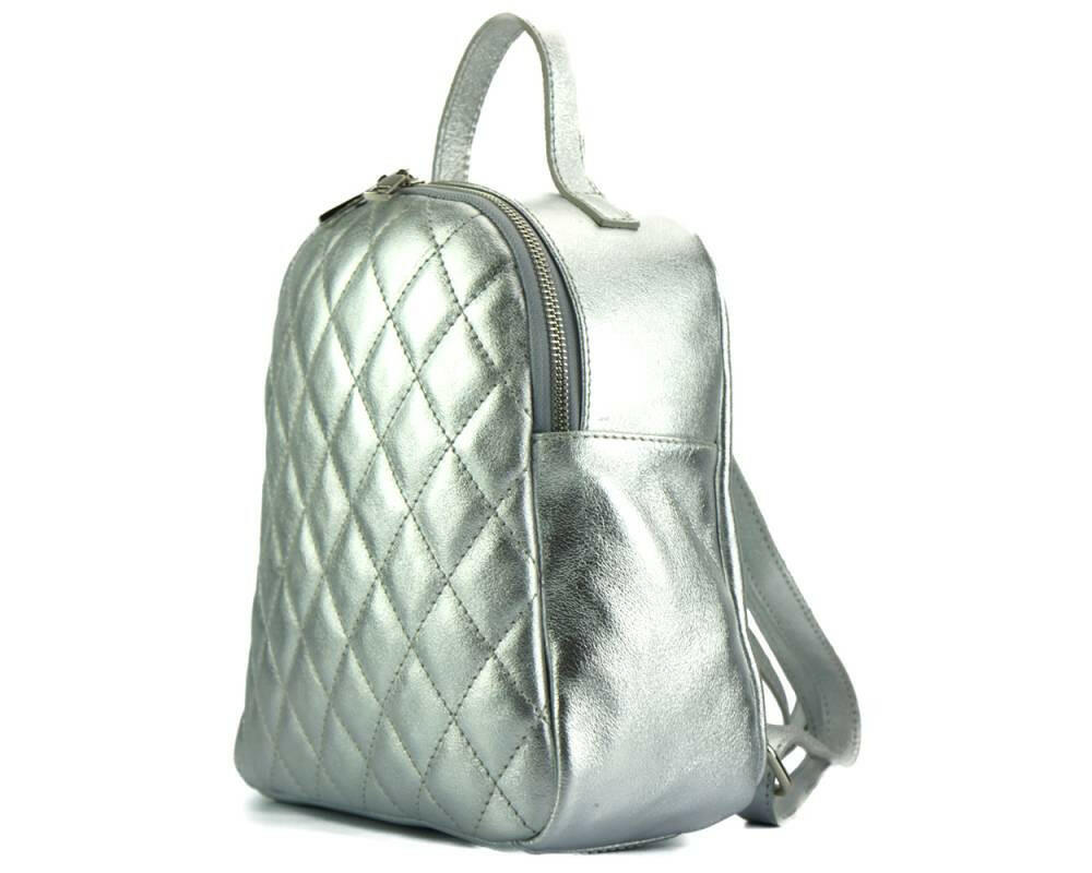 Elegant leather backpack exemplifying luxury craftsmanship and timeless style, perfect for discerning travelers.