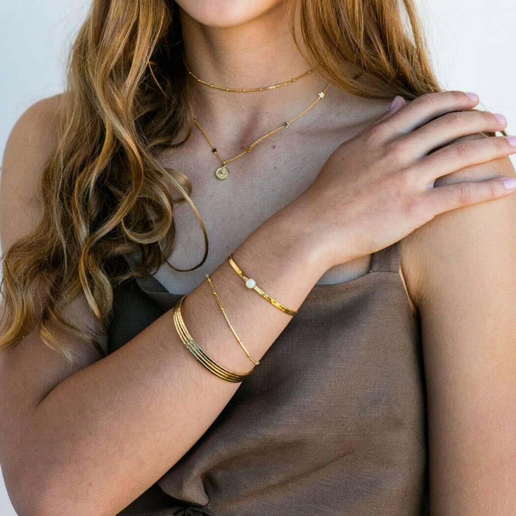 Gold Hammered Bangle Set | Artisans.