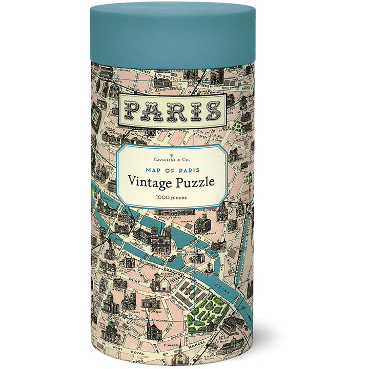 Cylindrical puzzle box with map design and 'Paris' text on a white background